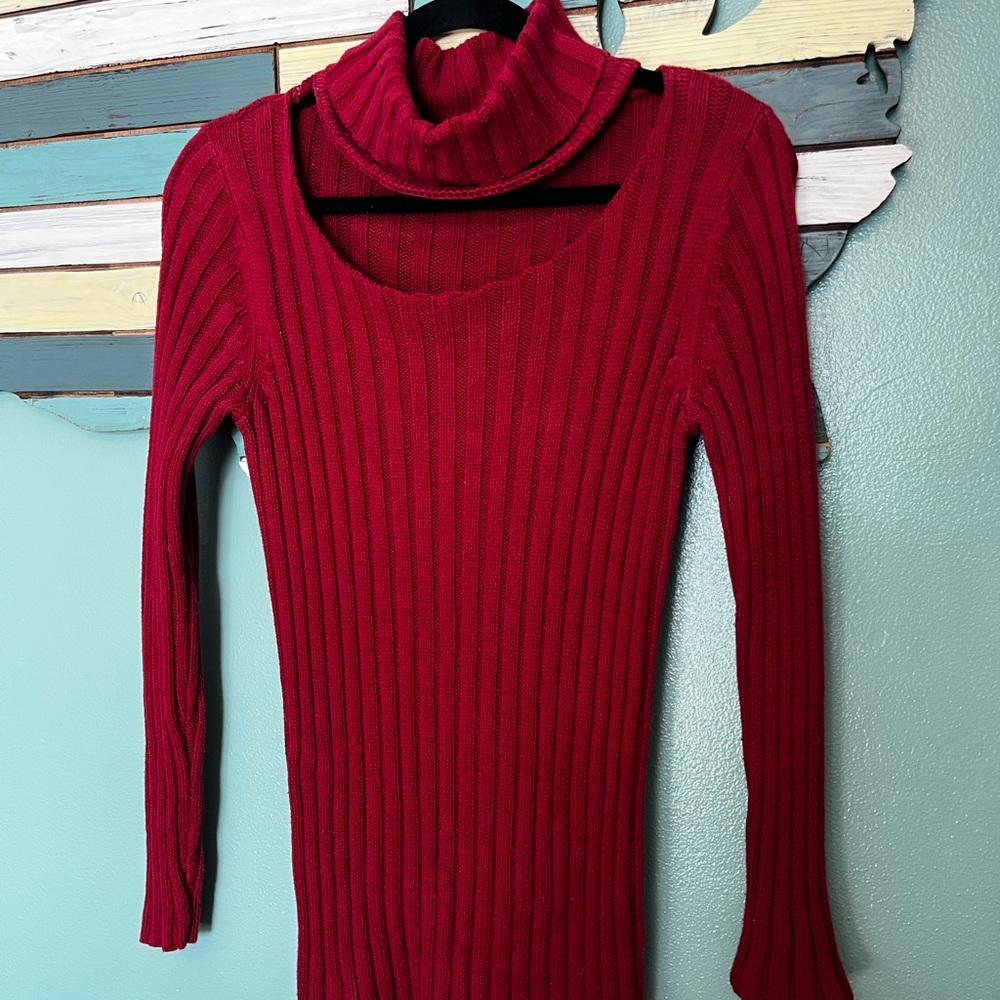 Red sweater.